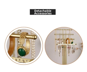 Close-up of detachable gold metal parts for the multi-tier jewelry display stand