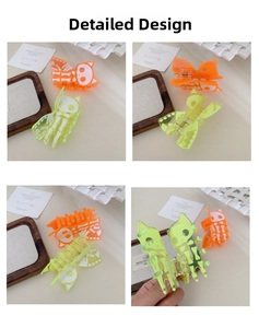 Detail view of fluorescent acrylic Halloween cat skeleton hair claw clips in neon colors
