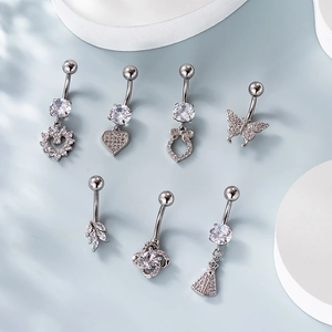 Set of 7 silver stainless steel belly rings with zircon in heart and butterfly designs