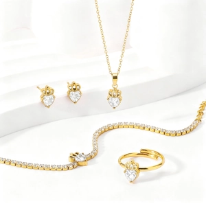 Luxurious gold heart-shaped zircon jewelry set including necklace, earrings and ring