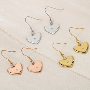 Minimalist heart-shaped dangle earrings in gold, silver, and rose gold finishes
