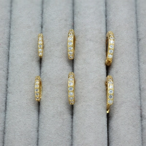 Three sizes of 18k gold plated micro-pave hoop earrings with sparkling cubic zirconia stones