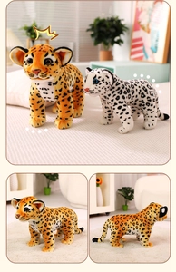 Detailed view of plush leopard toy in yellow and white spots with soft fur texture