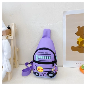 Detail of purple school bus kids chest bag with cartoon graphics on white desk