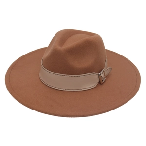 Detailed view of brown wool fedora with a beige leather belt and silver metal buckle