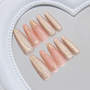 French ins style cat-eye press-on nails in nude and gold almond shape design