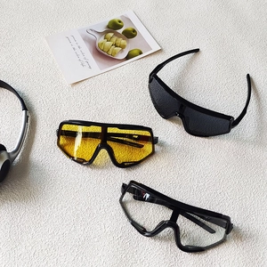 Kids sports sunglasses with UV protection in black, yellow, and clear lens colors