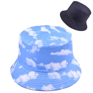 Detail of blue sky cloud print and solid black wide brim bucket hats for outdoor wear