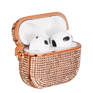 Detail view of champagne gold diamond-encrusted case for AirPods 3 with metal ring