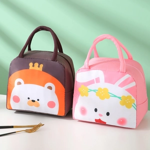 Cartoon insulated lunch bags with cute lion and bunny prints on white surface