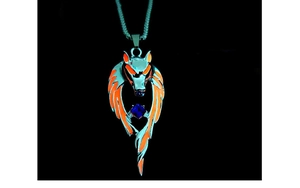 Detailed close-up of a silver wolf pendant with glowing orange wings and a blue gemstone
