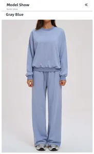 Grayish blue sweatshirt set featuring ribbed cuffs and wide-leg drawstring pants