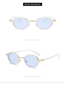 Detail of white gold oval sunglasses with blue lenses and minimalist frame design
