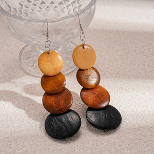 Bohemian style wooden bead earrings with gradient round disks on silver hooks