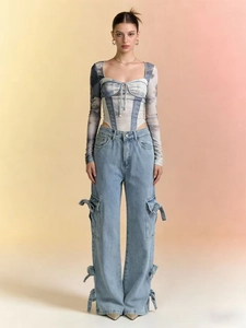 Women stylish floral print bodysuit paired with light blue baggy cargo denim jeans