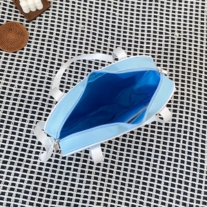 Top view of blue and white heart ita bag showing spacious interior compartment details