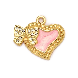 Close-up of golden heart pendant with pink enamel and rhinestone butterfly detail