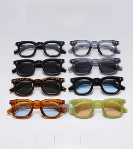 Detailed grid of vintage round sunglasses in black, tortoiseshell and crystal frames