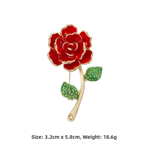 Detail of red rose flower brooch with gold trim and crystal leaves showing 3.2cm size
