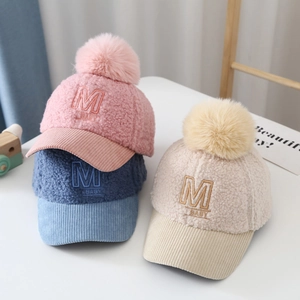 Fleece baseball cap for babies with plush pompom and corduroy brim in three colors