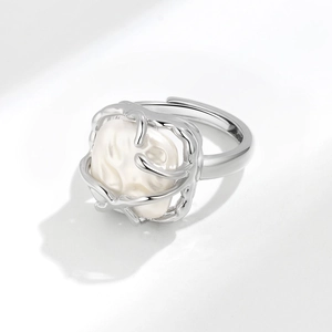 Elegant French vine silver ring with a baroque pearl, featuring a minimalist open-loop design