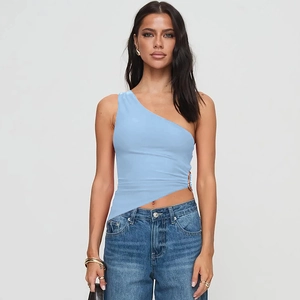 Detailed view of sky blue one-shoulder top with asymmetric hem and slim fit design