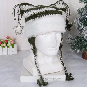 Detail of knit cat ear hat with green stripes, star charm, and faux fur earflaps