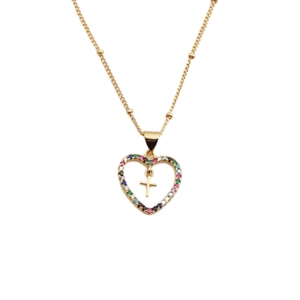 Golden heart necklace with colorful gemstone inlay and internal cross pendant on white background