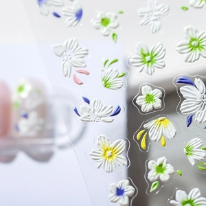 3D embossed floral nail art stickers with colorful petals and textured matte finish