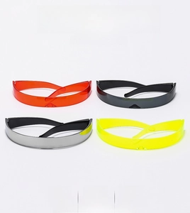 Matrix display of futuristic punk sunglasses in red, black, silver, and neon yellow