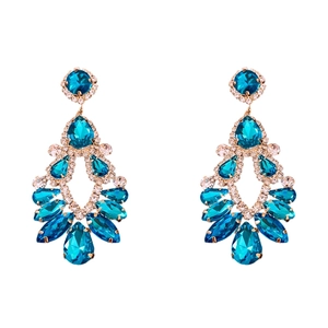 Luxurious gold teardrop earrings with peacock blue gemstones and sparkling rhinestones