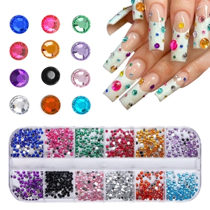 Detailed view of 12-color nail art rhinestone set with clear storage box and nail display