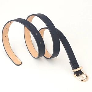 Slim dark blue women's PU leather belt with elegant golden horseshoe buckle on white background