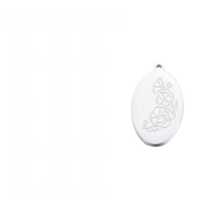 Detail view of oval birthday flower necklace pendants in polished stainless steel