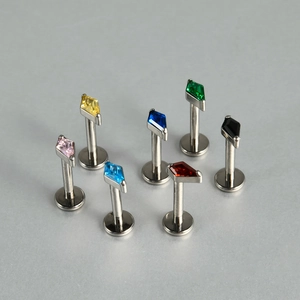 Detailed set of labret studs with colorful rhombus-cut zircons and flat-back design