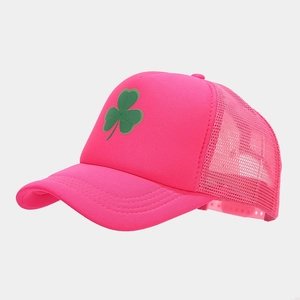 Detail of pink trucker hat featuring green clover print and breathable mesh back