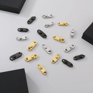 Detailed macro view of magnetic Miami cuban chain clasps in gold silver and matte black