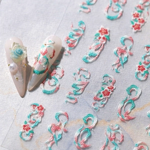 5D embossed nail stickers featuring delicate red flowers and green vine patterns