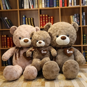 Detailed view of three nested plush teddy bears with Love hearts and ribbon bows