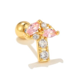 Macro detail of gold mushroom earring with pink marquise gems and screw ball back