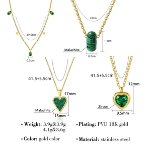 Detail view of four 18K gold PVD stainless steel necklaces with malachite and zircon