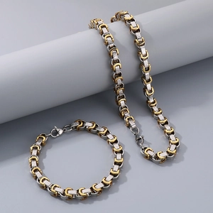 Detail of Byzantine style steel chain necklace and bracelet set with Greek key patterns