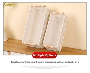 Detail of two rectangular woven cotton rope baskets with wooden handles and fabric lining