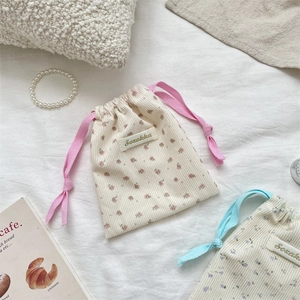 Floral corduroy drawstring pouches for makeup and lipstick with cute rustic detail