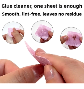 Detailansicht der rosa fusselfreien Nageltücher mit runder Textur zur Kleberentfernung