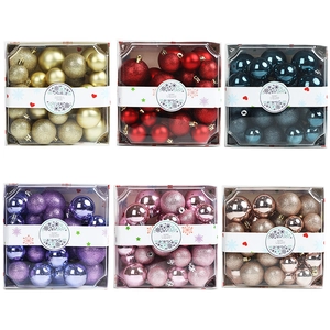 Detailed grid view of assorted matte and glitter Christmas ball ornaments in colorful box