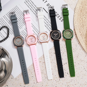 Five minimalist square quartz watches in various colors with textured silicone straps