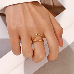 18K gold plated minimalist wave and rope twist stacking rings shown on finger