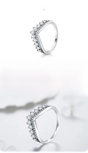 Macro detail of V-shaped S925 sterling silver crown ring with cubic zirconia stones