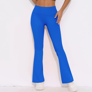 Detail of high waisted flared yoga leggings in vibrant blue with tummy control band